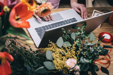 Poster - Florist accepts order for flowers delivery through the online store