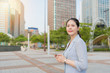© PR Image Factory - woman walking on blue sky sunny day