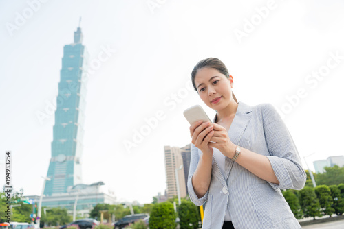 фотография beautiful woman texting message to her client