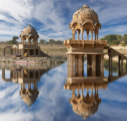 Wall Mural - Gadi Sagar temple on Gadisar lake Jaisalmer, India.