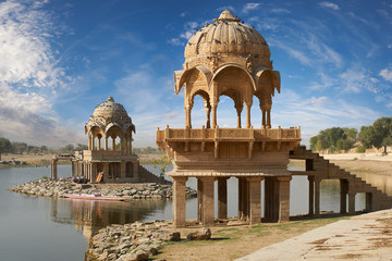 Wall Mural - Gadi Sagar temple on Gadisar lake Jaisalmer, India.