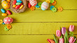 Colorful Easter still life with eggs and flowers