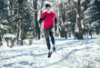 © Mediteraneo - Young man running at winter in park