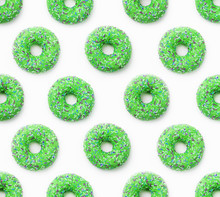 Collage Of Green Doughnuts In Glaze On A White Background. Lots Of Donuts Mosaic, A Tasty Fresh Green Donut Drizzled With Glaze