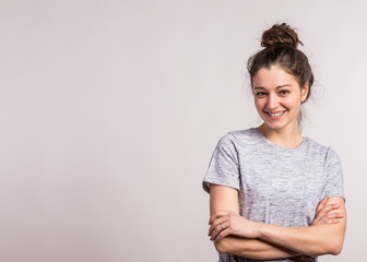 Portrait of a young beautiful woman in studio.