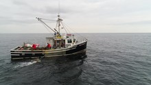 Aerial Shot Commercial Ocean Fishing Boat Checking Lobster Traps