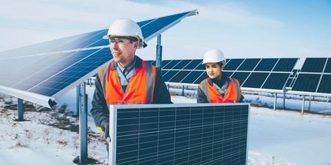 Wall Mural - solar power station worker
