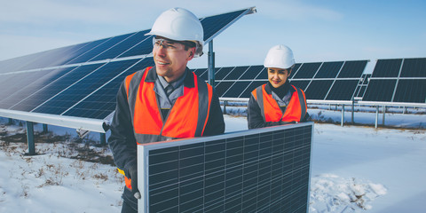 Wall Mural - solar power station worker