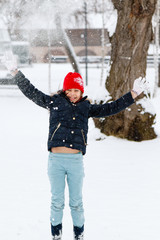 Wall Mural - girl throwing snow