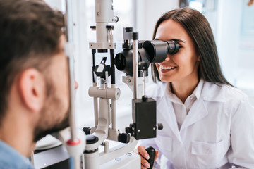 Wall Mural - Doctor and patient in ophthalmology clinic