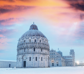 Poster - Baptistery of Pisa after a winter snowfall at dusk. Square of Miracles at dawn