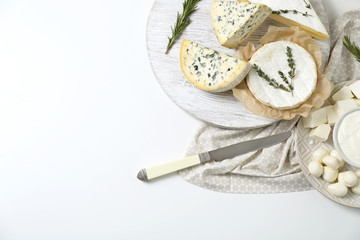 Poster - Different cheeses on white background. Fresh dairy products