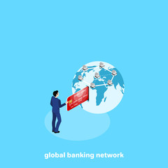 a man in a business suit inserts a credit card into the globe as in an ATM, an isometric image