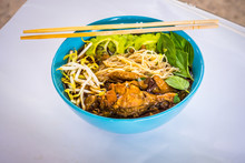 Braised Chicken Soup With Bitter Gourd Noodle On White Background With Clipping Path.
