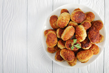 Canvas Print - fried hot meat cutlets on white plate