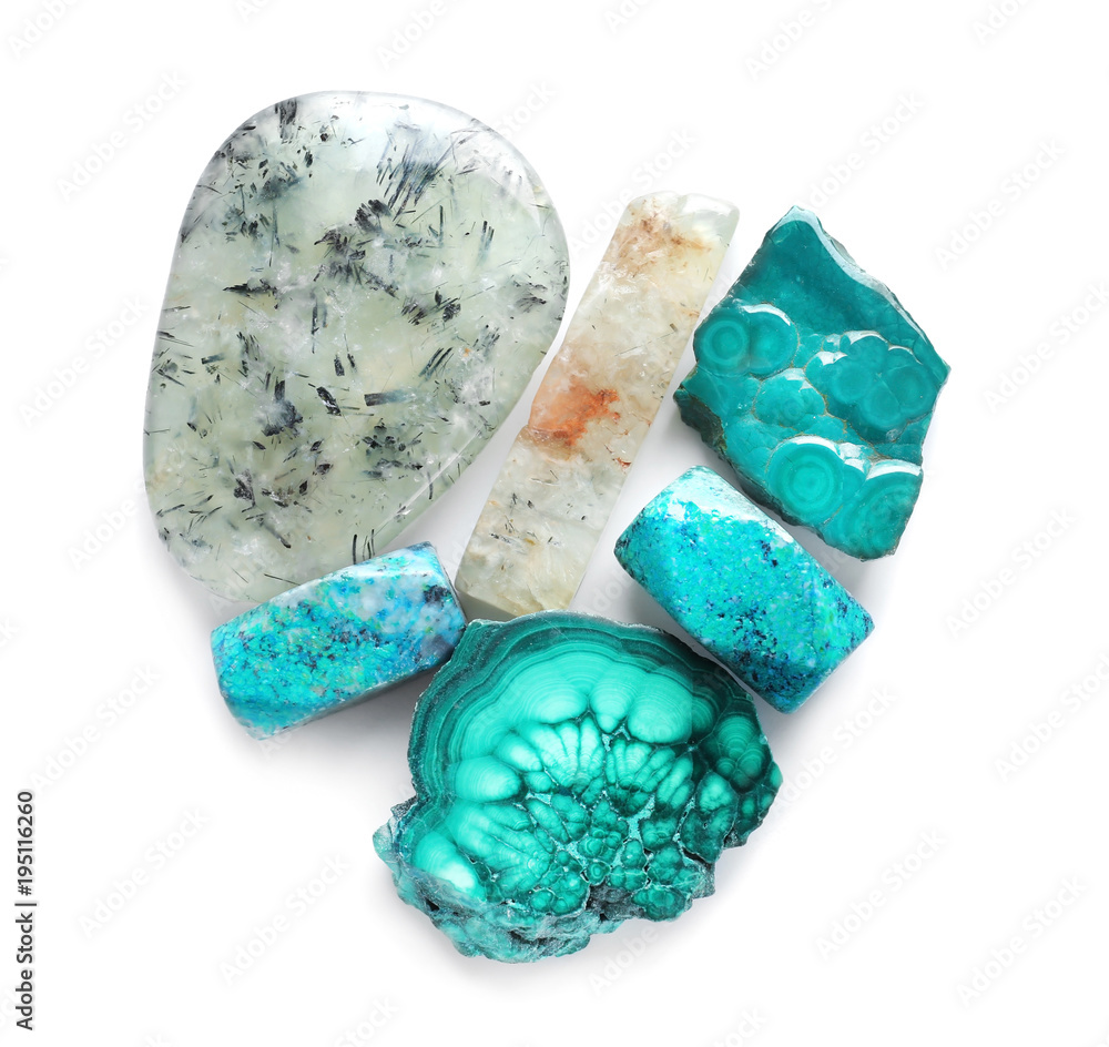 Different natural semi-precious stones for jewellery on white background