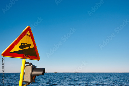 Fotografía Slope traffic signal on a vessel. Caution alert curiosity warning