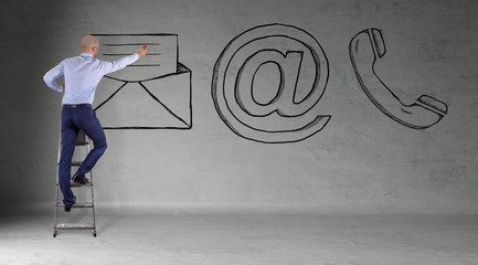 Poster - Businessman drawing e-mail sketch on a wall 3D rendering
