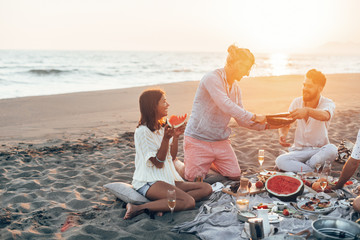 Wall Mural - People Having Beach Picnic