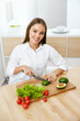 © puhhha - Healthy Diet. Woman Cooking Food, Cutting Vegetables For Salad