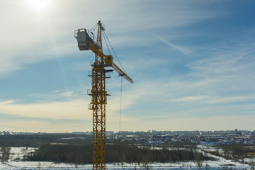 Crane builds a house