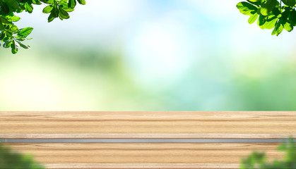 Aufkleber - Empty step plank wood table top with blur tree in park with bokeh light background and leaves foreground,Mock up template for display of your design,Banner for advertise of product,panorama view