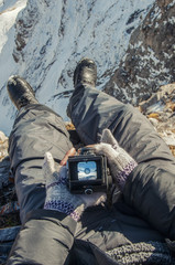 Wall Mural - look at the mountain scenery through the viewfinder of an old camera