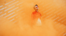 Woman On Orange Background