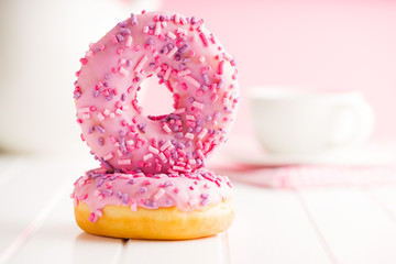 Two pink donuts.