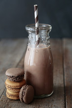 Macaroons with bottle of chocolate milk
