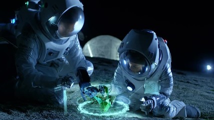 Wall Mural - two astronauts analyzing plant life found on alien planet. infographics show animated data about oxy