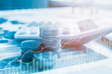 Stack coin money with report finance and banking with profit graph of stock market trade indicator financial.Double exposure style