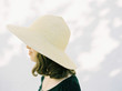© Kirstin Mckee/Stocksy - Close up of profile of girl wearing hat