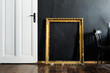 © Aleksandar Novoselski/Stocksy - Door and frame in black interior