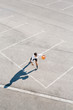 © jadiezlo/Stocksy - Young man playing streetball