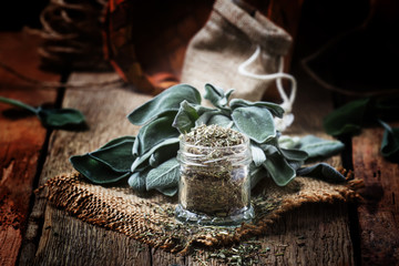 Canvas Print - Dried and fresh sage, rustic style, vintage wooden background, selective focus