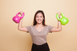 Healthy Asian woman with kettlebell