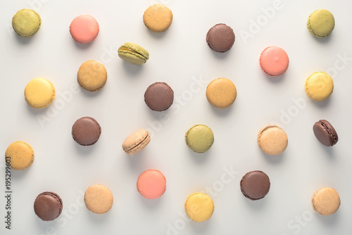 top view of colorful macarons cookies like background, dessert concept