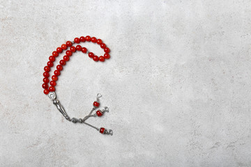 Wall Mural - Muslim prayer beads on gray background