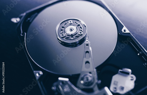 Fotografia Disassembled hard drive from the computer, hdd with mirror effect