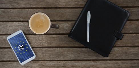 Poster - Composite image of mobile phone, coffee, pen and organizer on