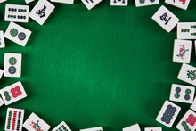 White-green Tiles For Mahjong On On Green Cloth Background