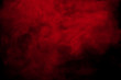 Leinwandbild Motiv Abstract red smoke on black  background. Red color clouds.