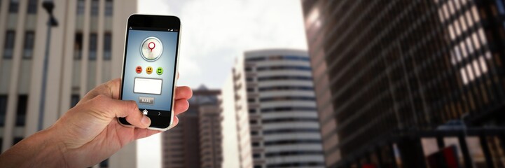 Wall Mural - Composite image of cropped image of person holding mobile phone