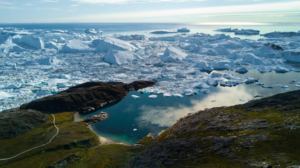 Wall Mural - ilulissat fjord. drone view to many icebergs.