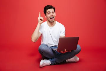 Sticker - Portrait of a confident young man in white t-shirt