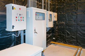 Electrical Room, medium and high voltage switcher, equipment, panel to control and protect the electrical equipment and system by fuse, circuit breaker, control panel at power plant and substation