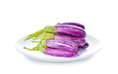 Wall Mural - eggplant in white plate on white background