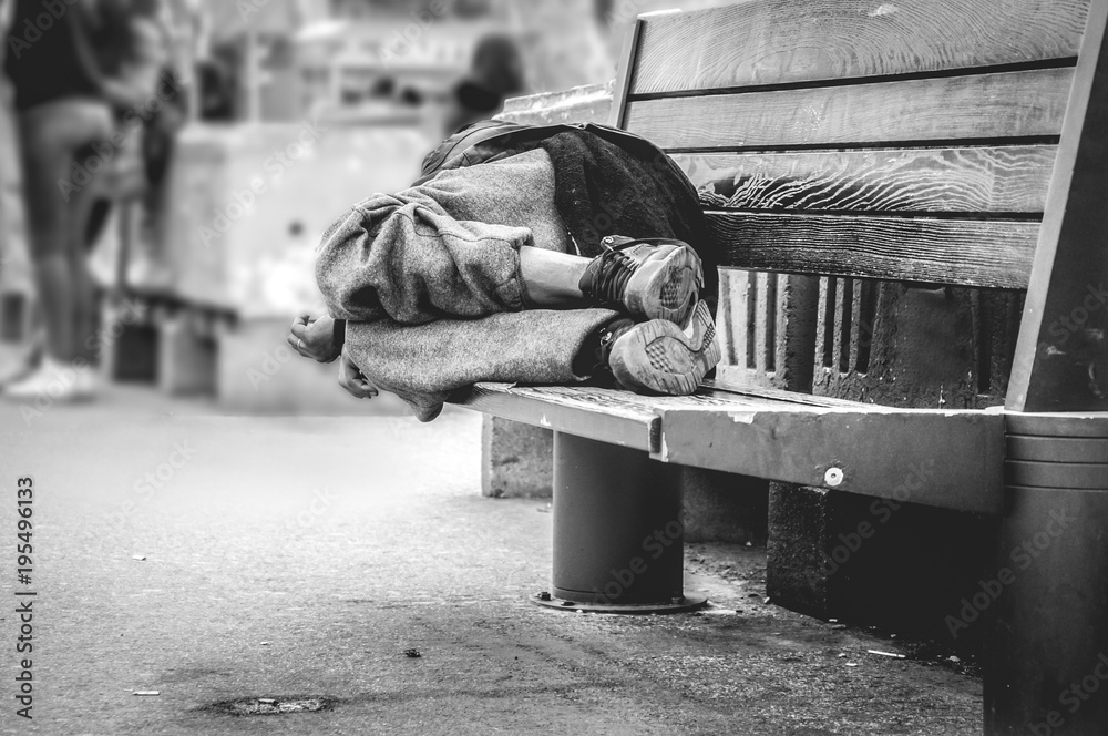 Poor Homeless Man Or Refugee Sleeping On The Wooden Bench On The Urban Street In The City Social Documentary Concept Selective Focus Black And White Wall Mural Srdjan