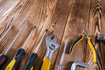 Set of different building equipments on the wooden table